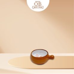 cremero pequeño de arcilla y loza